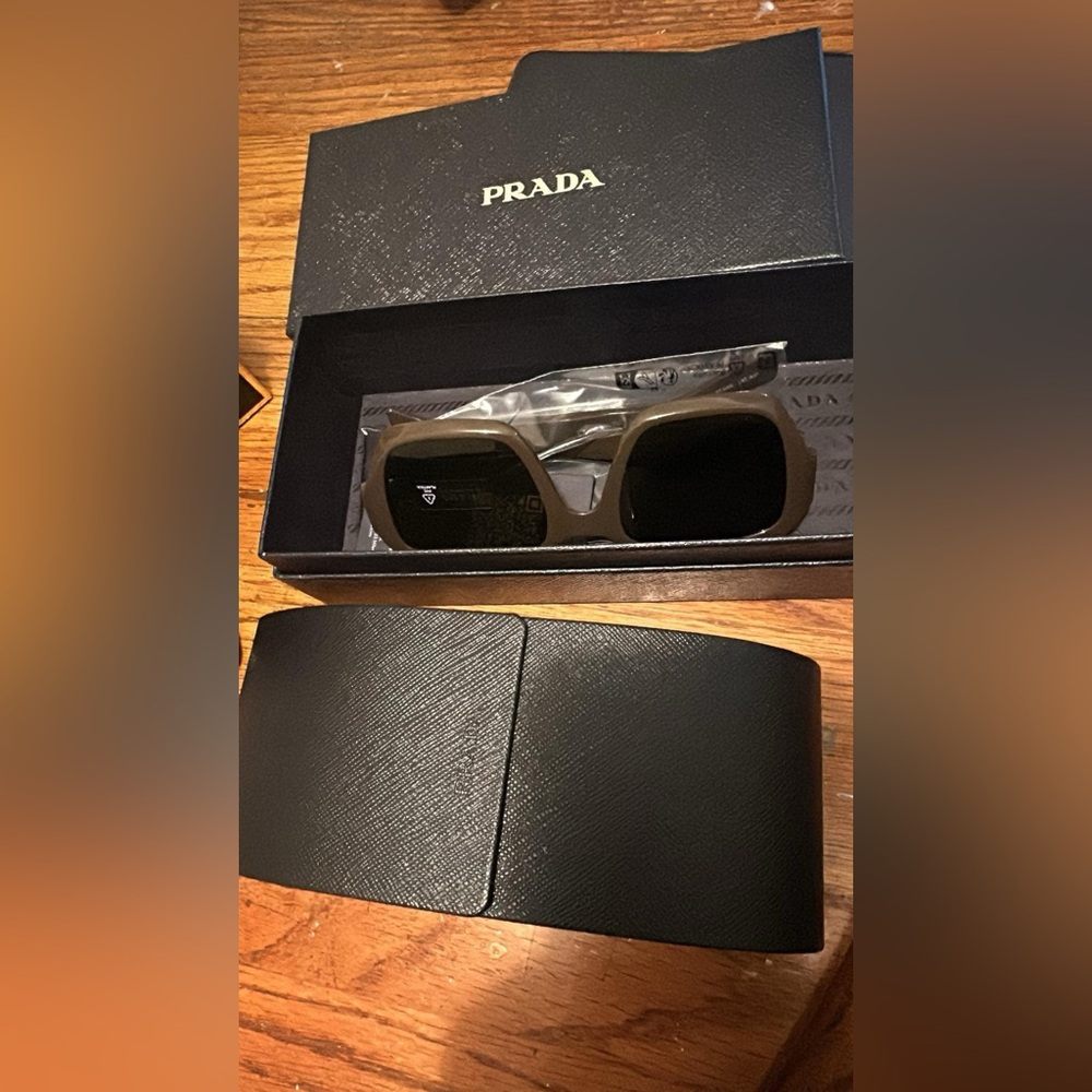 Prada sunglasses new with box.. never used